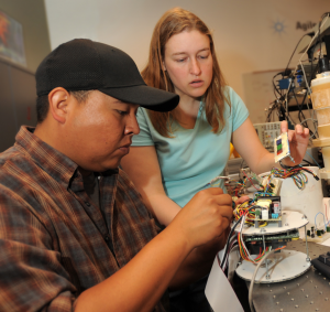 Professor and Student with Circuit